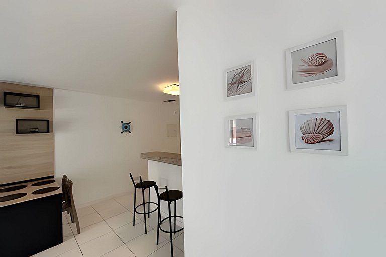 Apto a metros da Praia do Forte c/ Piscina e Hidro